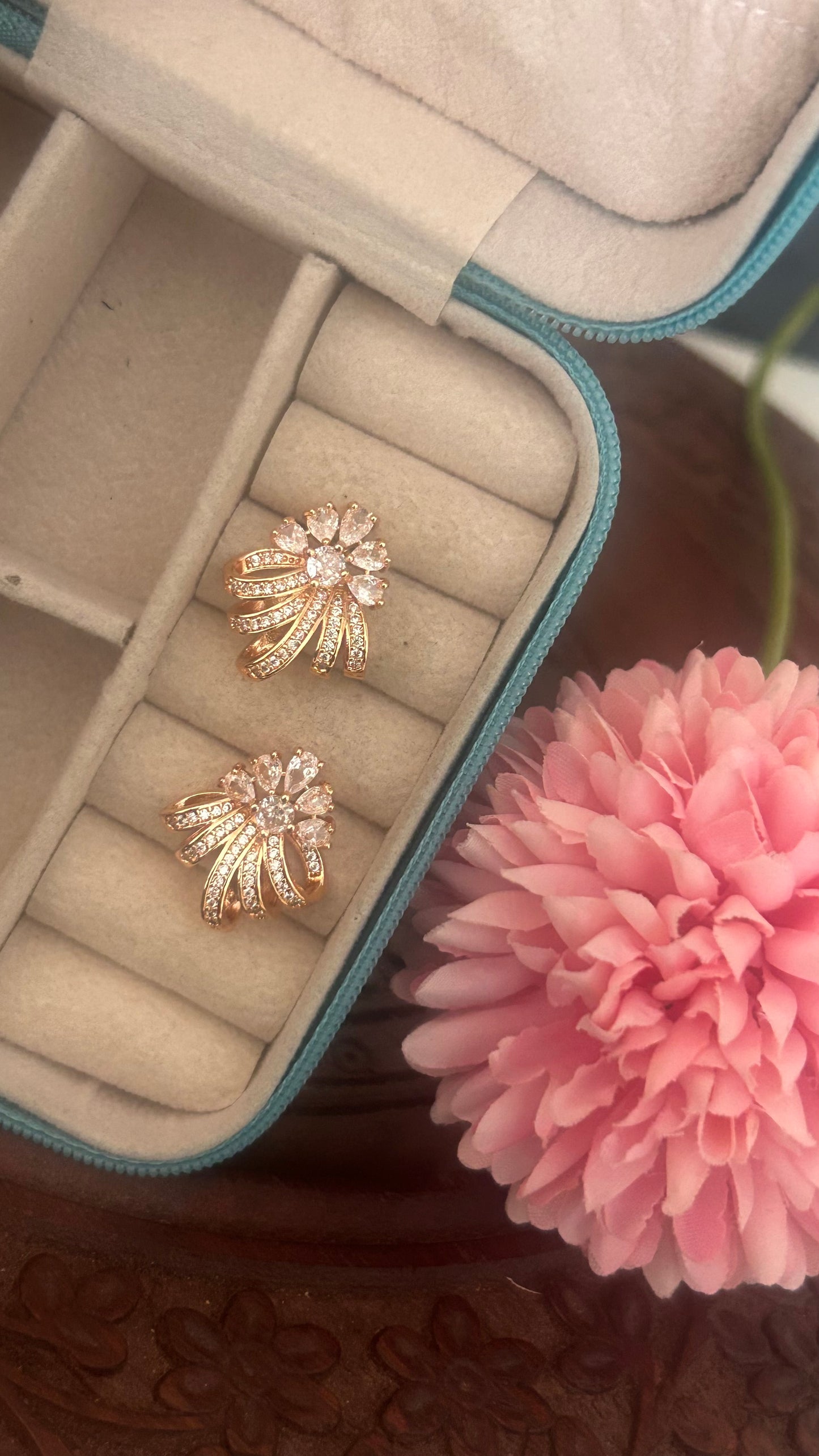 Cz flower with curved petals stud