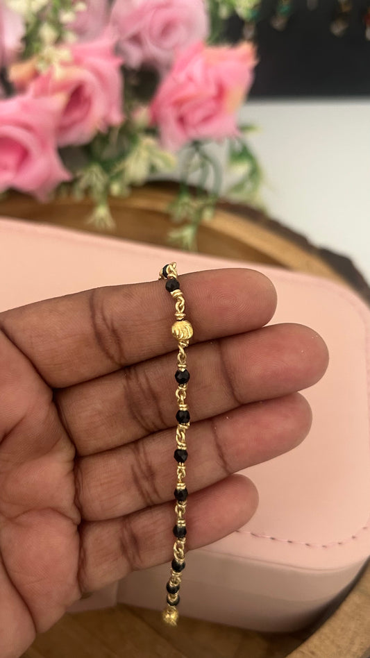 "Panchaloham Black Beads Bracelet (Unpolished) – 24, 26 & 28, bangles sizes it fits comfortably for these measurements."