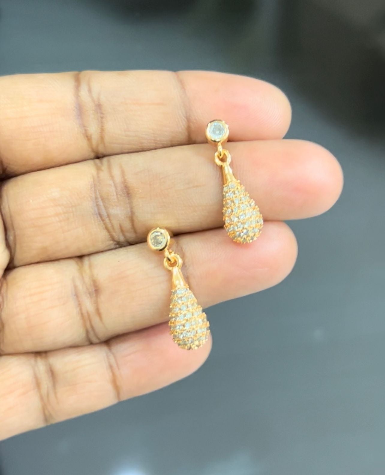 Golden Raindrop CZ Dangler Earrings – Elegant Drop Studs in Gold Finish