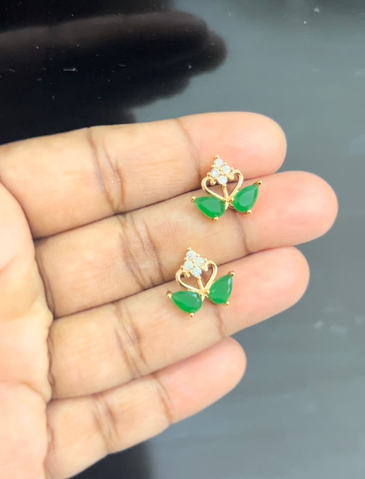 Swan shape white and green stone stud earrings1