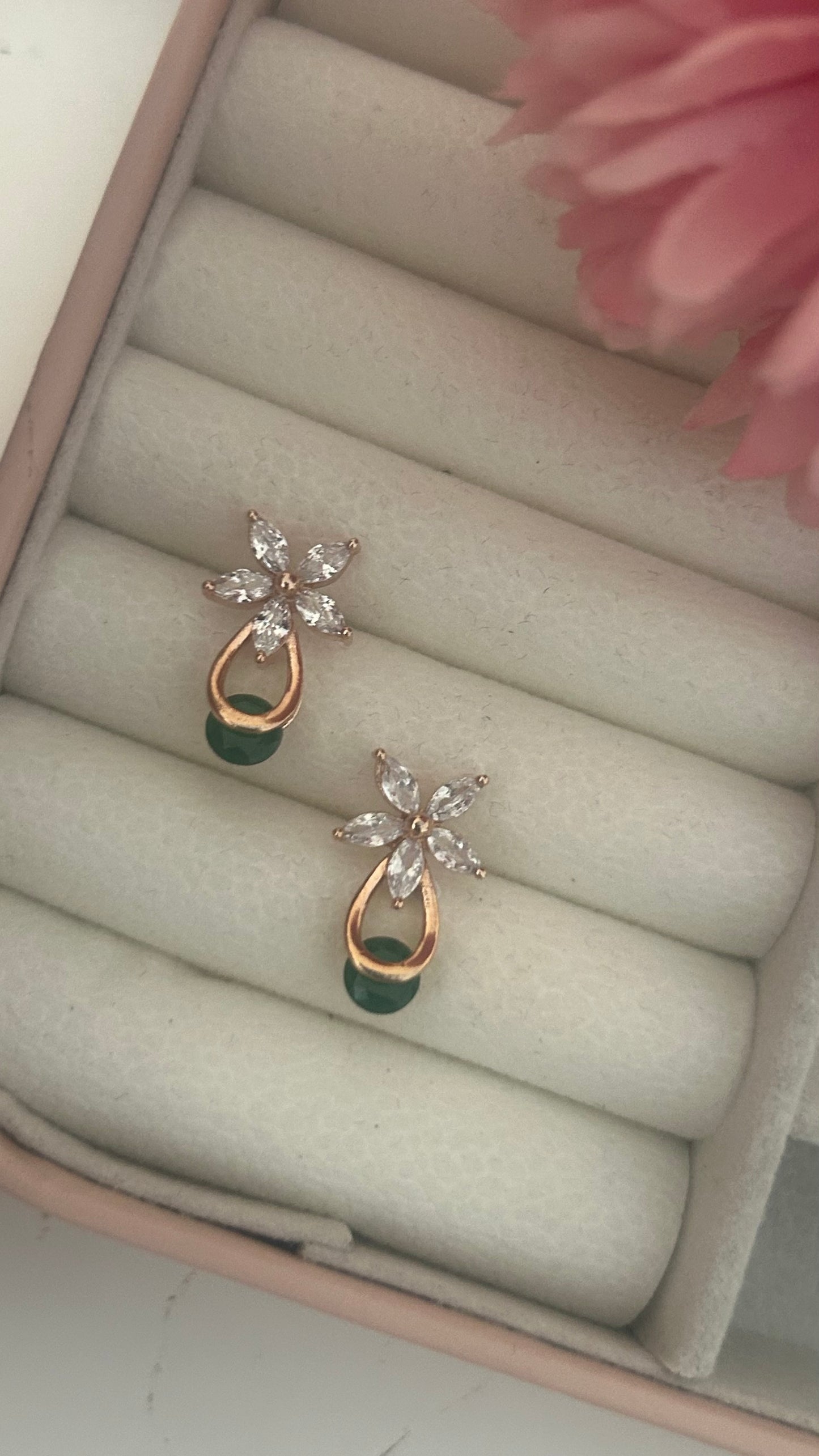 CZ white flower stud with green stone