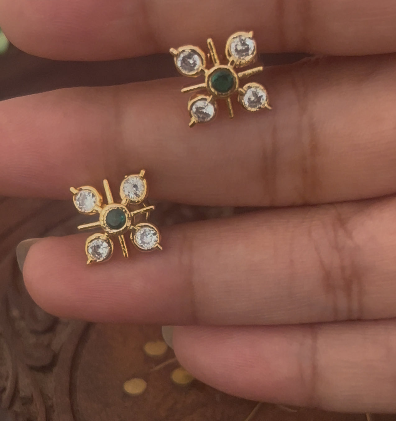"Elegant Panchaloham Stud Earrings with Emerald Center and Crystal Accents – Traditional Gold-Toned Jewelry"