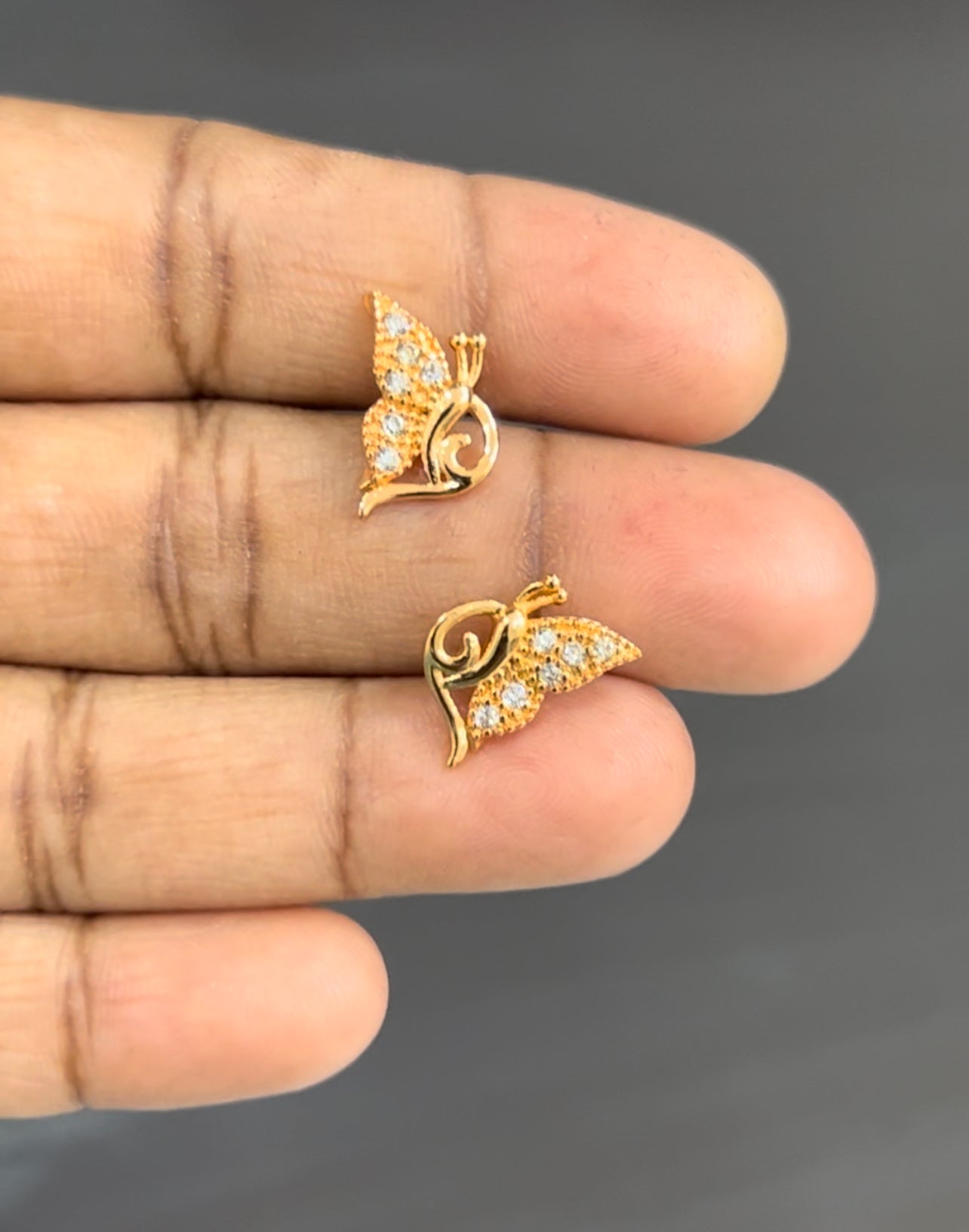 Crystal Flutter Studs – Elegant Butterfly CZ Earrings in Gold Finish