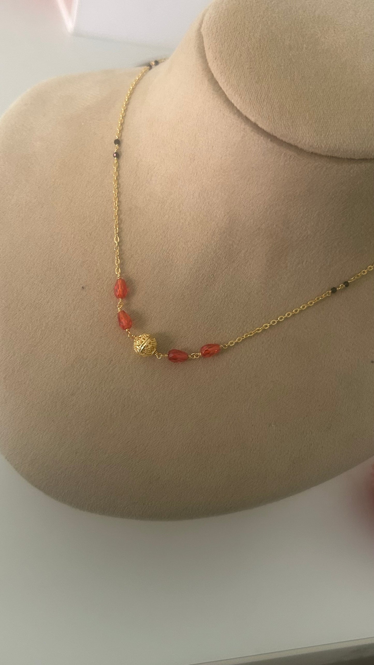 Blackbeads with Cz drops in 16 to 17 inches in orange colour