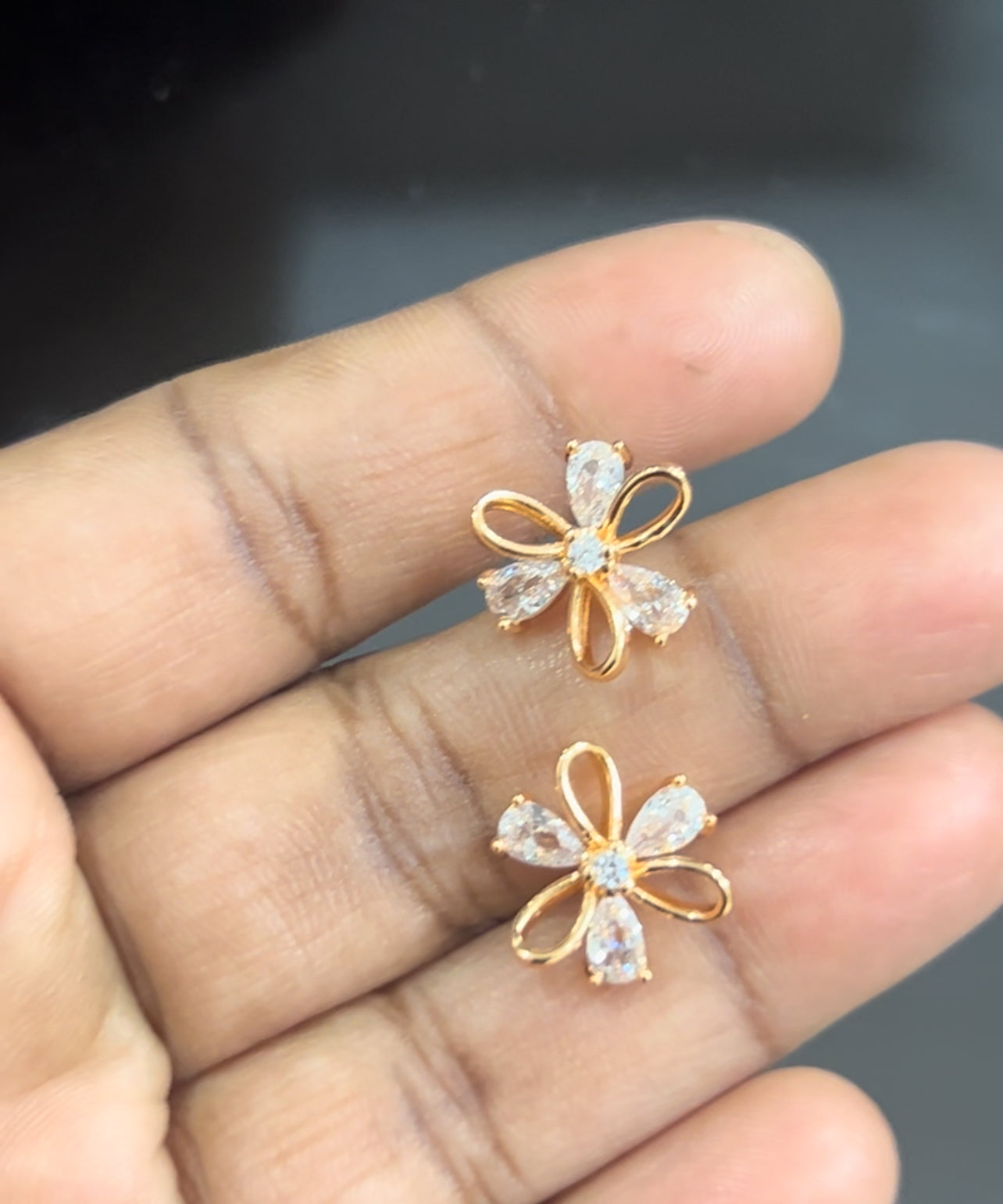 Floral Loop CZ Stud Earrings – Elegant Petal Design with Gold Finish