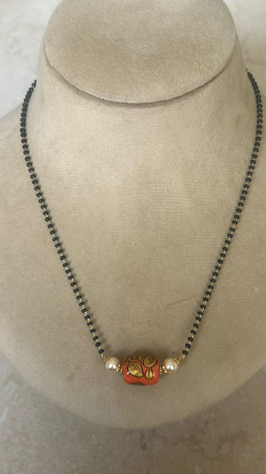 BLack bead with hand painted coral