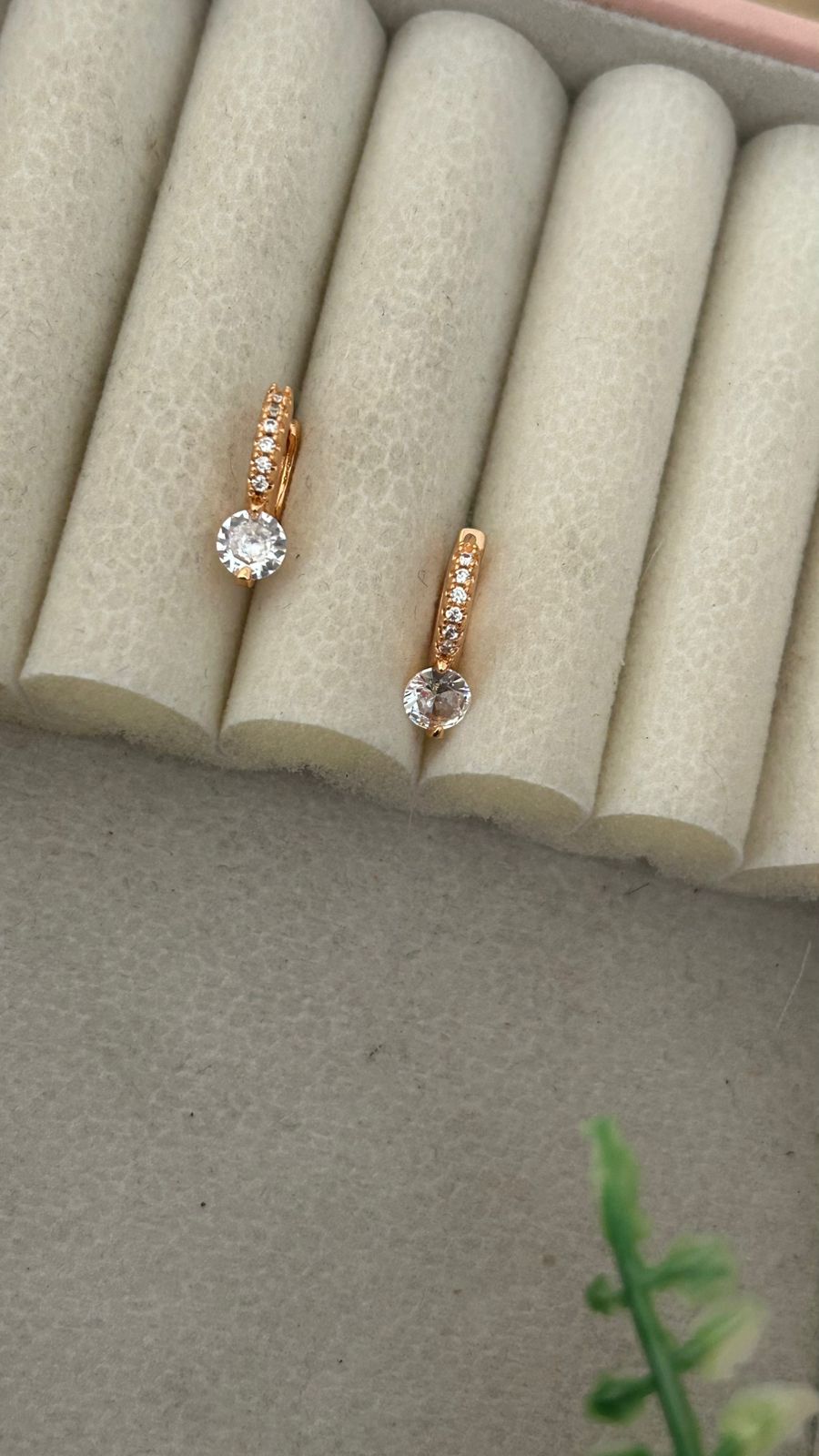 Gold Tone Huggie Earrings with Sparkling Crystal Drop