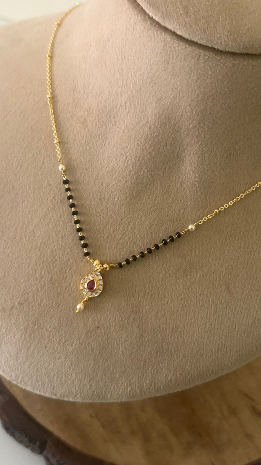 Elegant Black Beads Mangalsutra with RED Stone Pendant and Pearl Drop