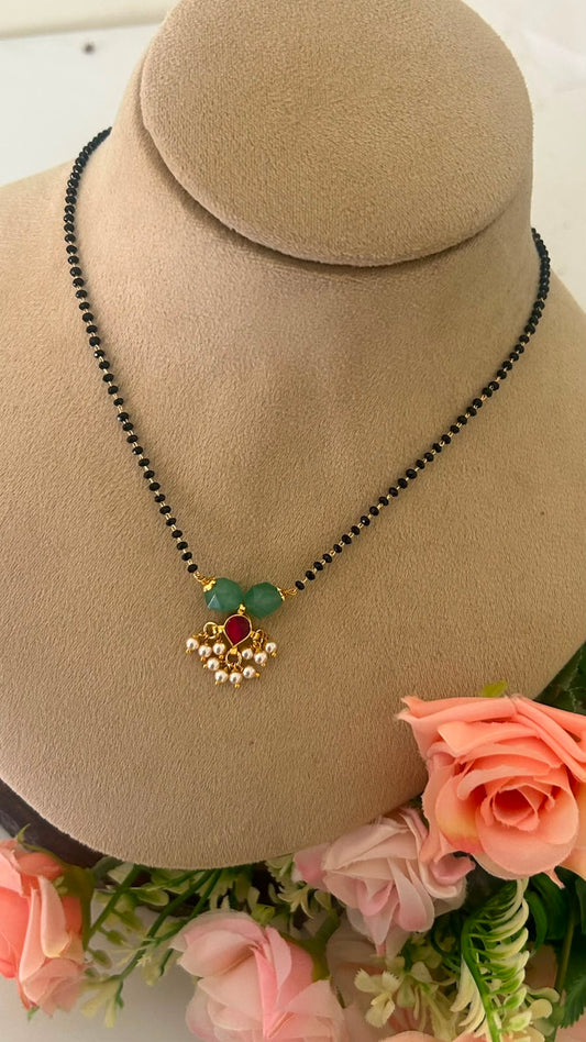 Black Beads Mangalsutra Chain with Green Beads, Red kundan pendent & Pearl Drops
