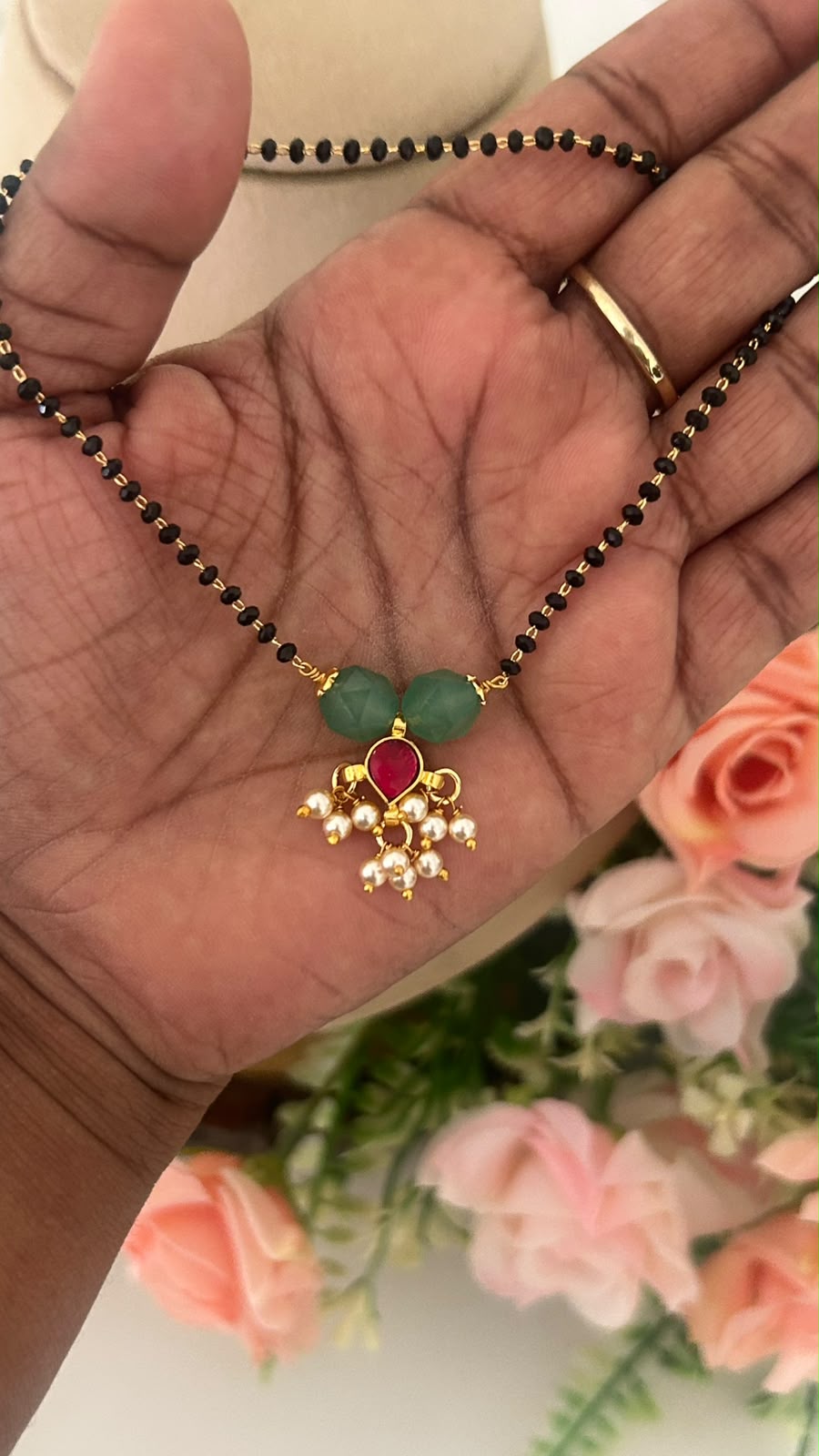 Black Beads Mangalsutra Chain with Green Beads, Red kundan pendent & Pearl Drops