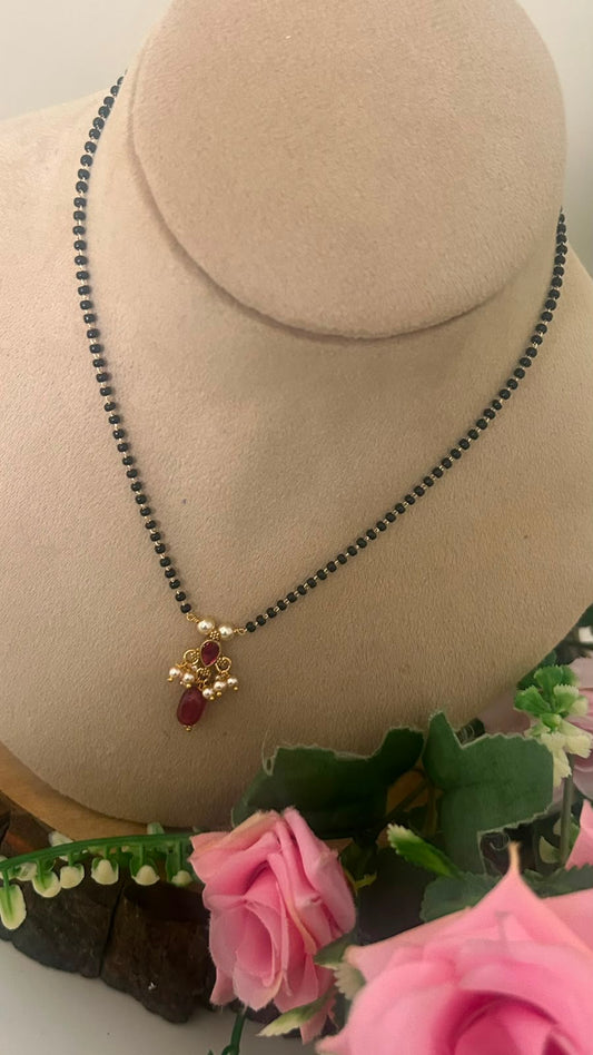 Ruby Stone kundan Pendant Black Beads Mangalsutra with Pearl Cluster for Women