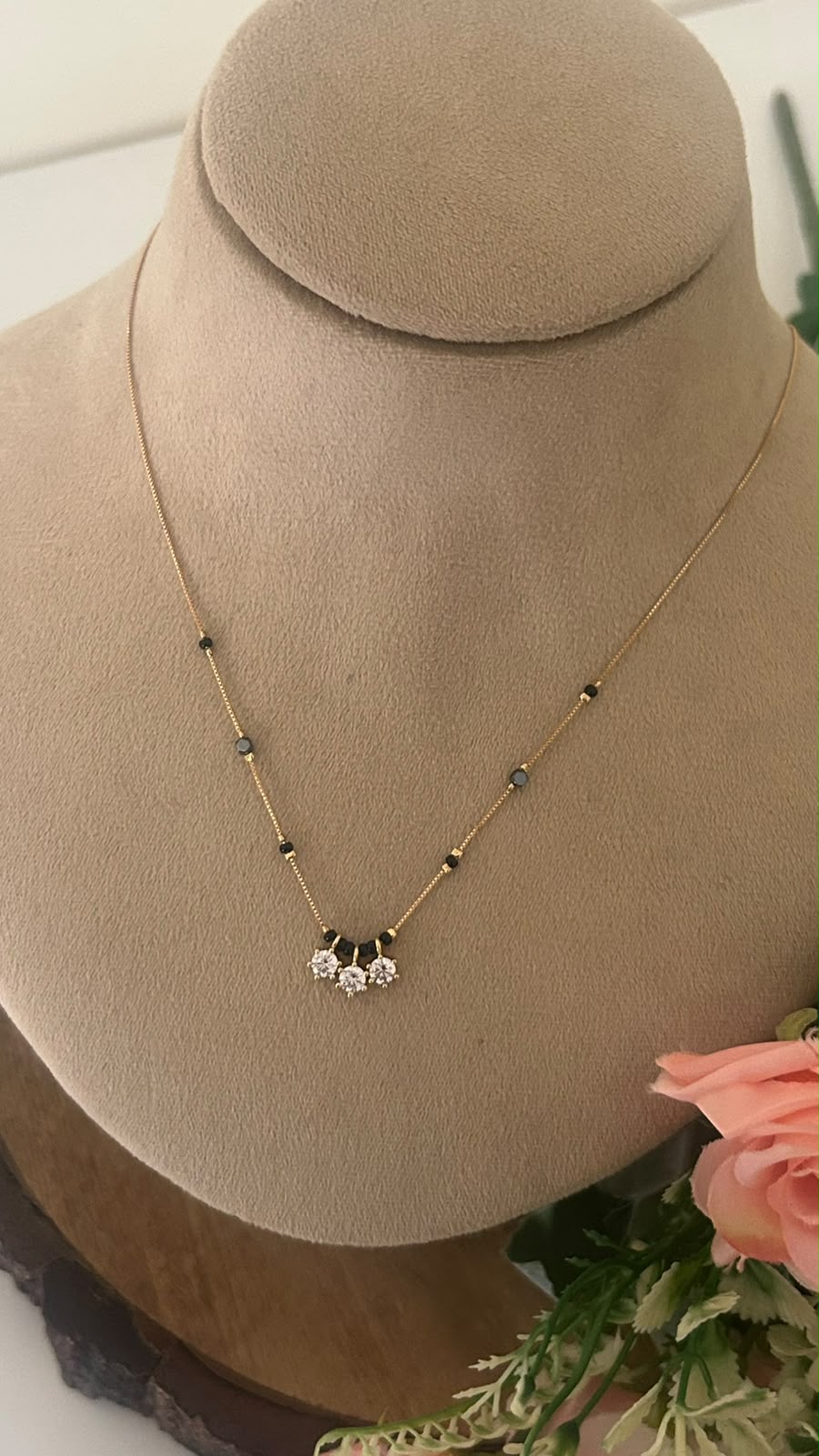 Elegant Three Blossom CZ Black Beads Mangalsutra Chain with Gold Finish