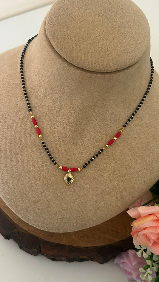 Delicate Black Beads Mangalsutra with Green Stone Pendant | 16–17 Inches