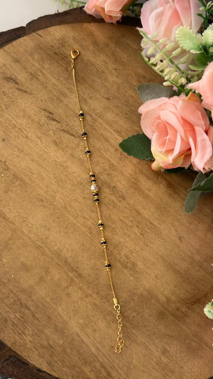 Minimalist Black Beads Nazariya Bracelet with Textured Central Bead