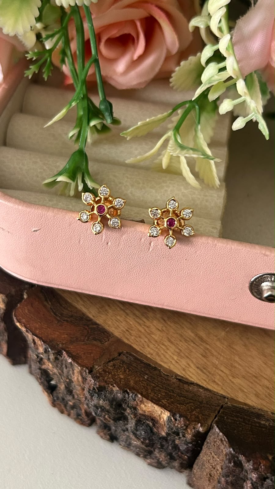 Panchaloham Polished Twinkle Star CZ Earrings in full white with middle red