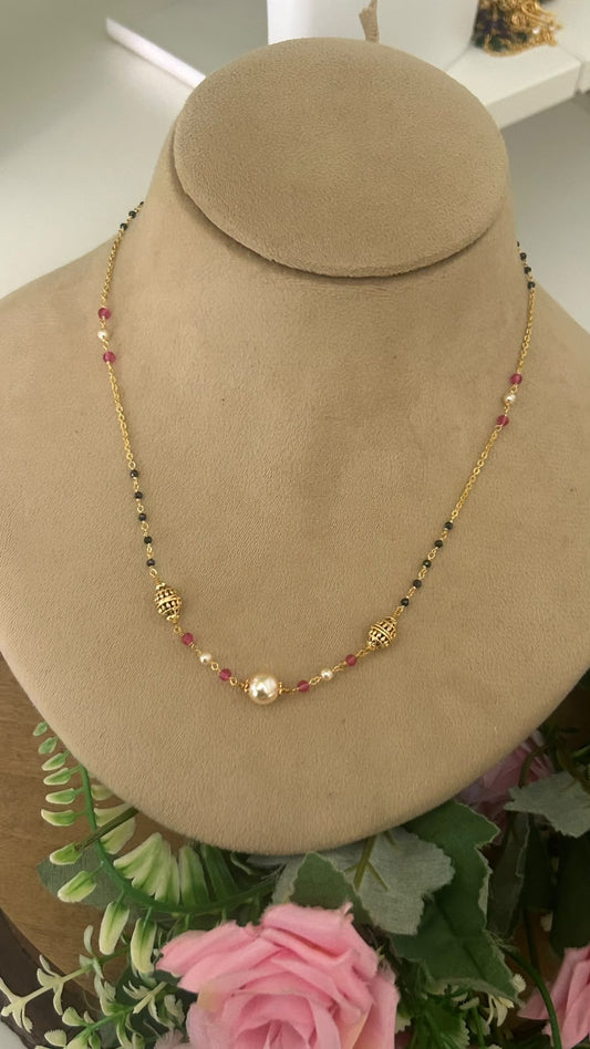 • Modern Minimalist Black Beads Short Mangalsutra with Pearl and Ruby Charms