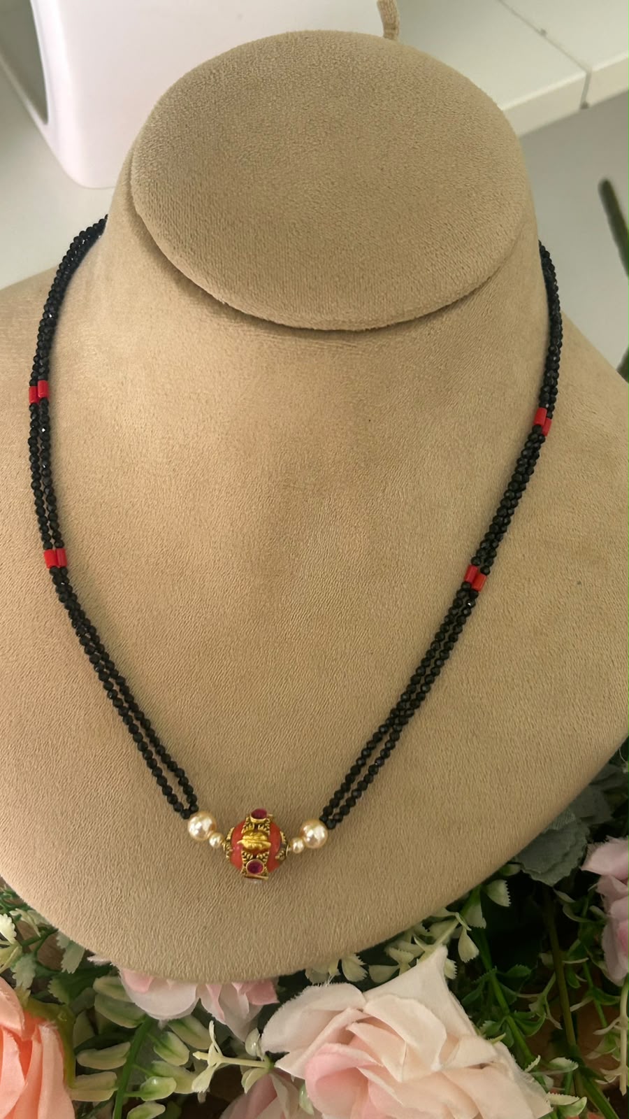 Designer Double Line Black Beads Mangalsutra with Red & Gold-Tone Traditional Pendant and Pearl Accents for Women