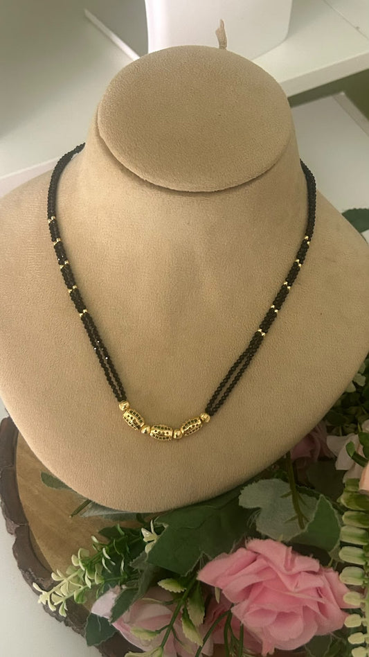 Elegant Double Line Black Beads Mangalsutra with Gold Tone Designer Filigree green Beads for Women