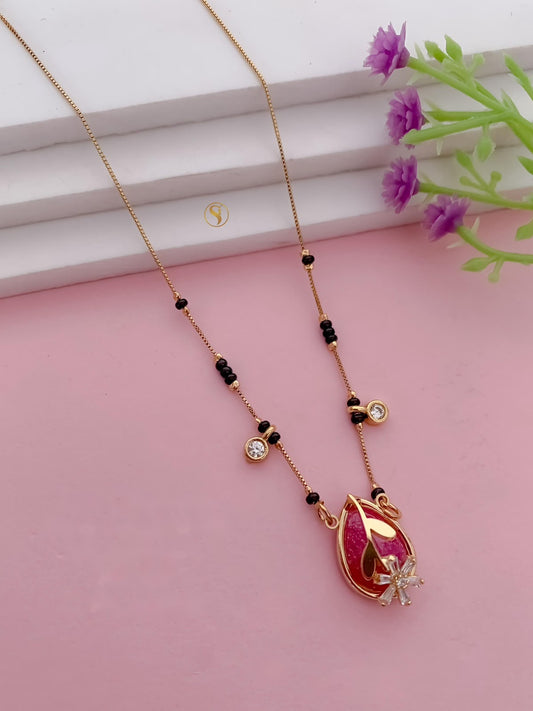 Fancy Gold Look Mangalsutra with Black Beads and Stone Pendant
