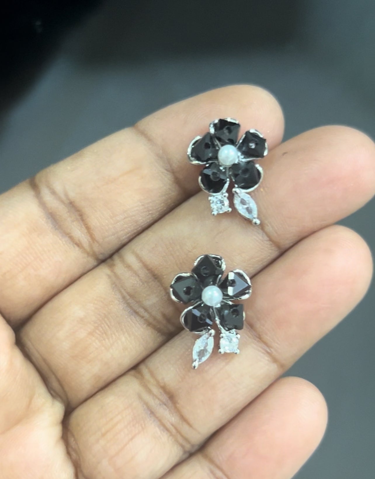 CZ black flower with leaf stud in sliver finish