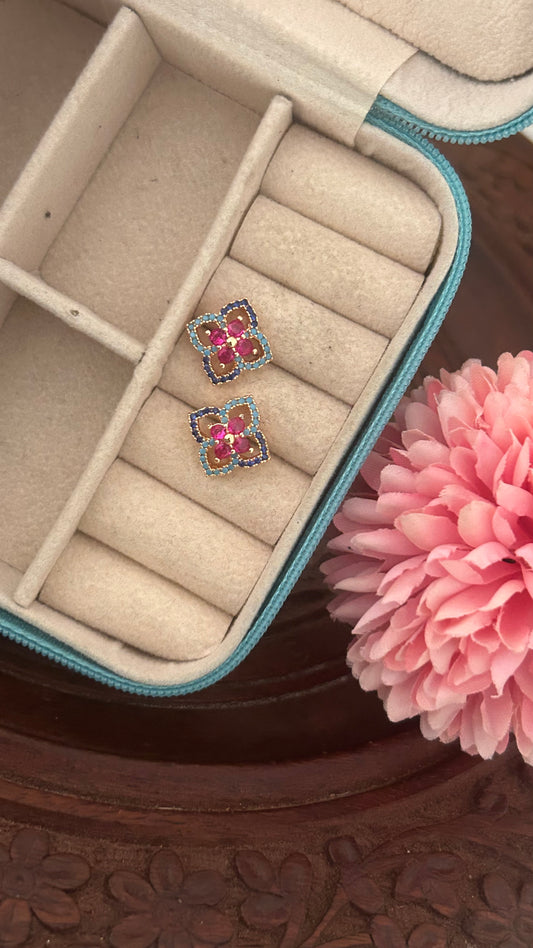 CZ flower stud in blue color