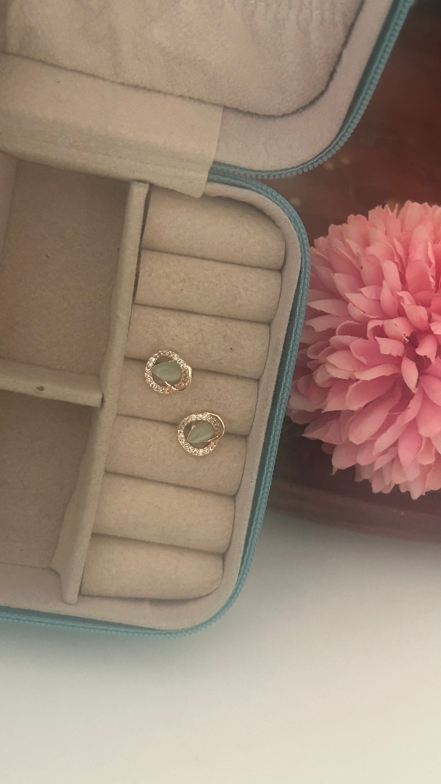Cz round shape stud in light green colour