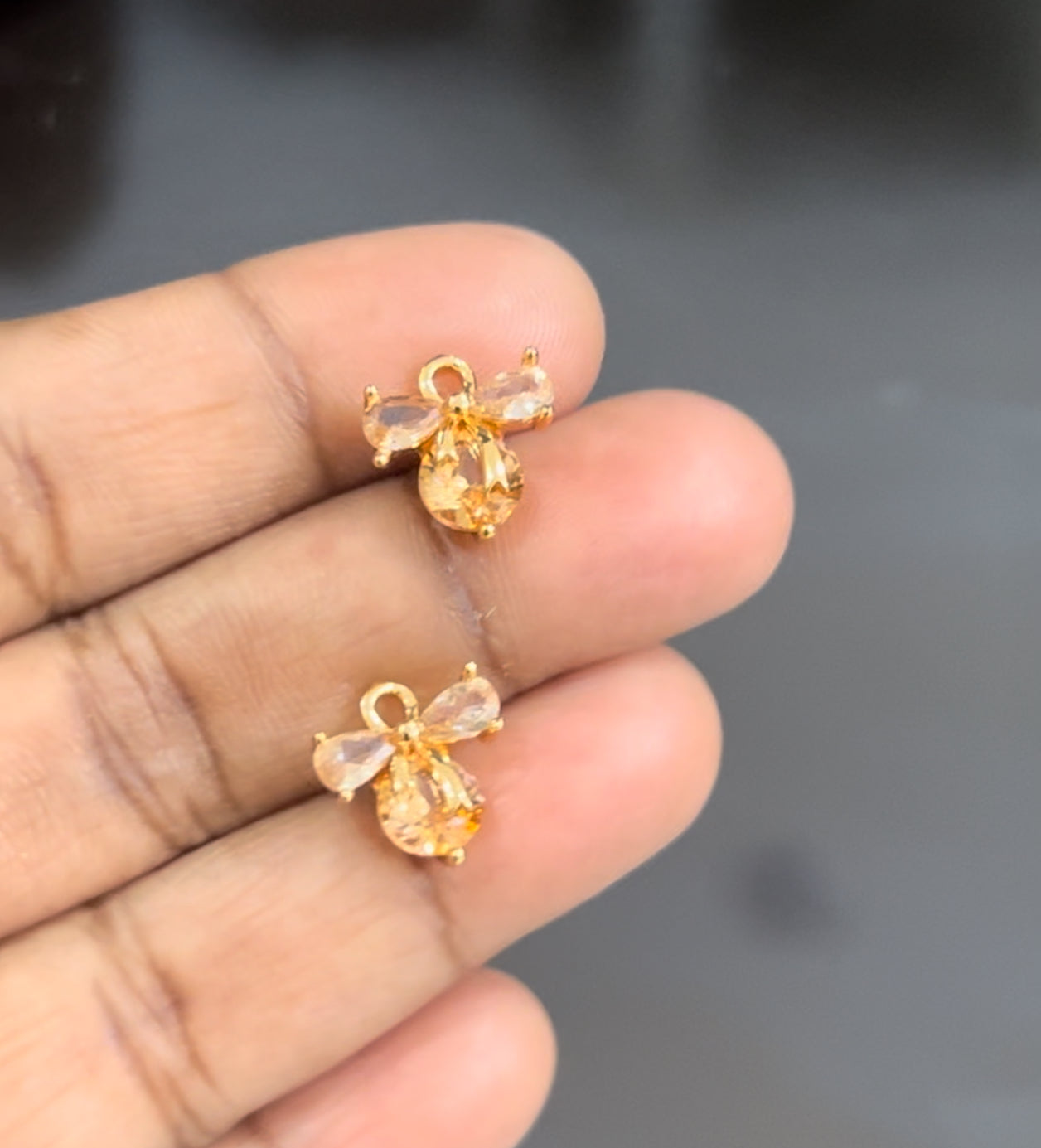 CZ now earrings in colour