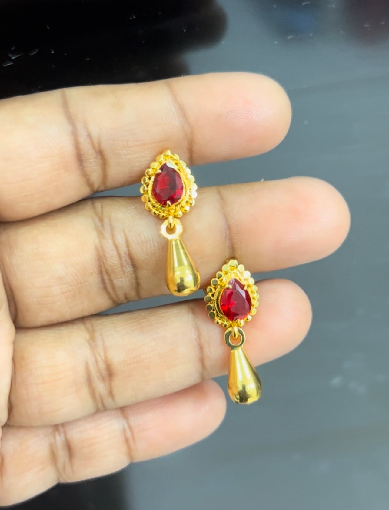 Red stone screwback earrings