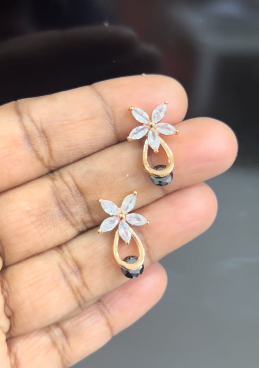 CZ flower stud with black stone