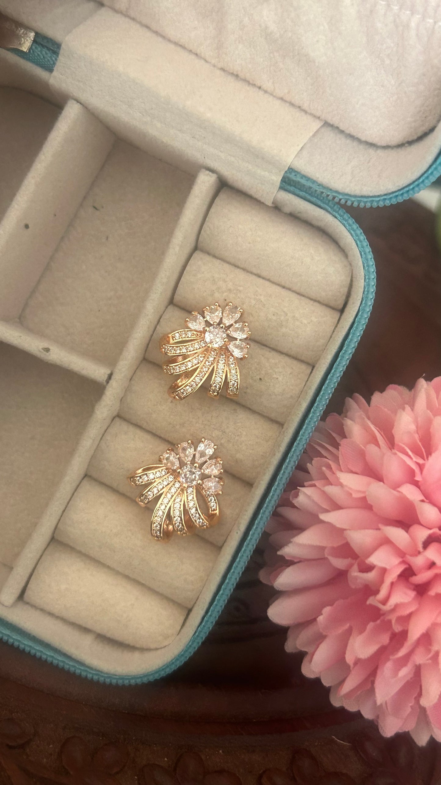 Cz flower with curved petals stud