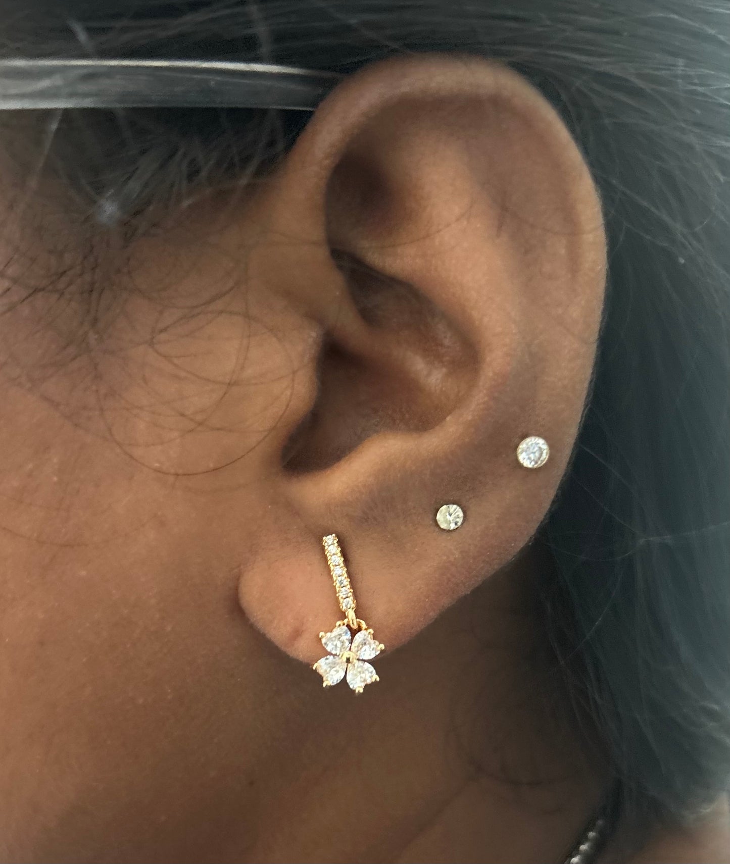 CZ single line stone stud with flower drop