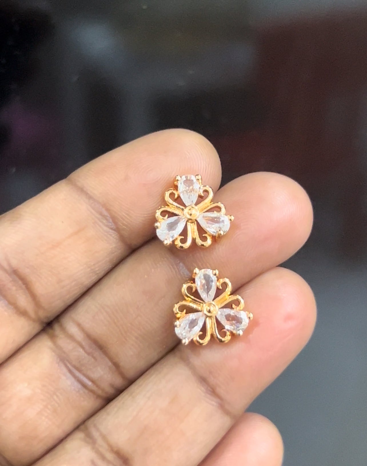 CZ 3 petal flower stud in white colour