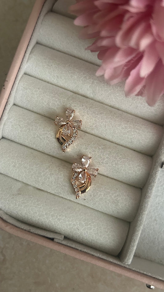 CZ 4 petal flower stone stud in colors