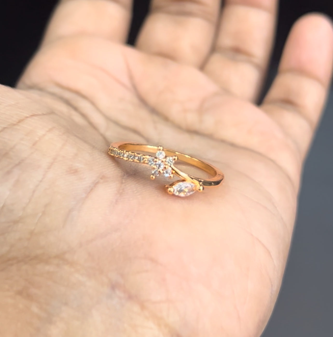 CZ flower with small leaf finger ring