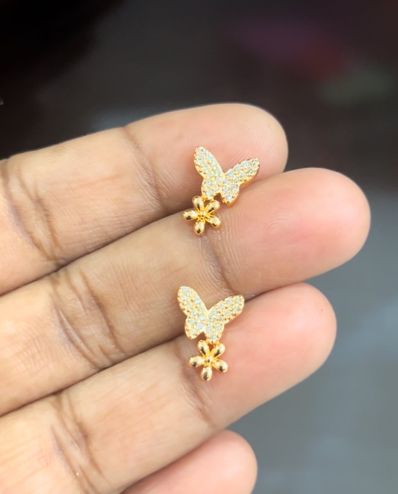 CZ butterfly stud with small flower