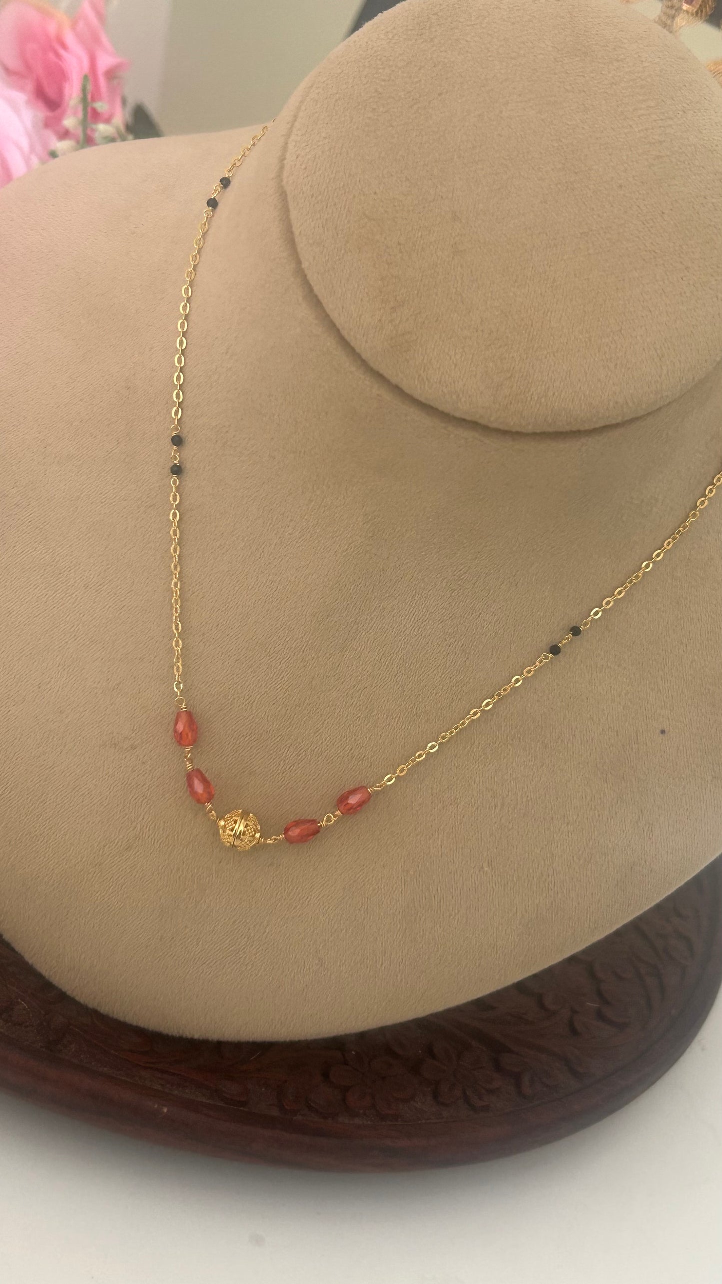 Blackbeads with Cz drops in 16 to 17 inches in orange colour