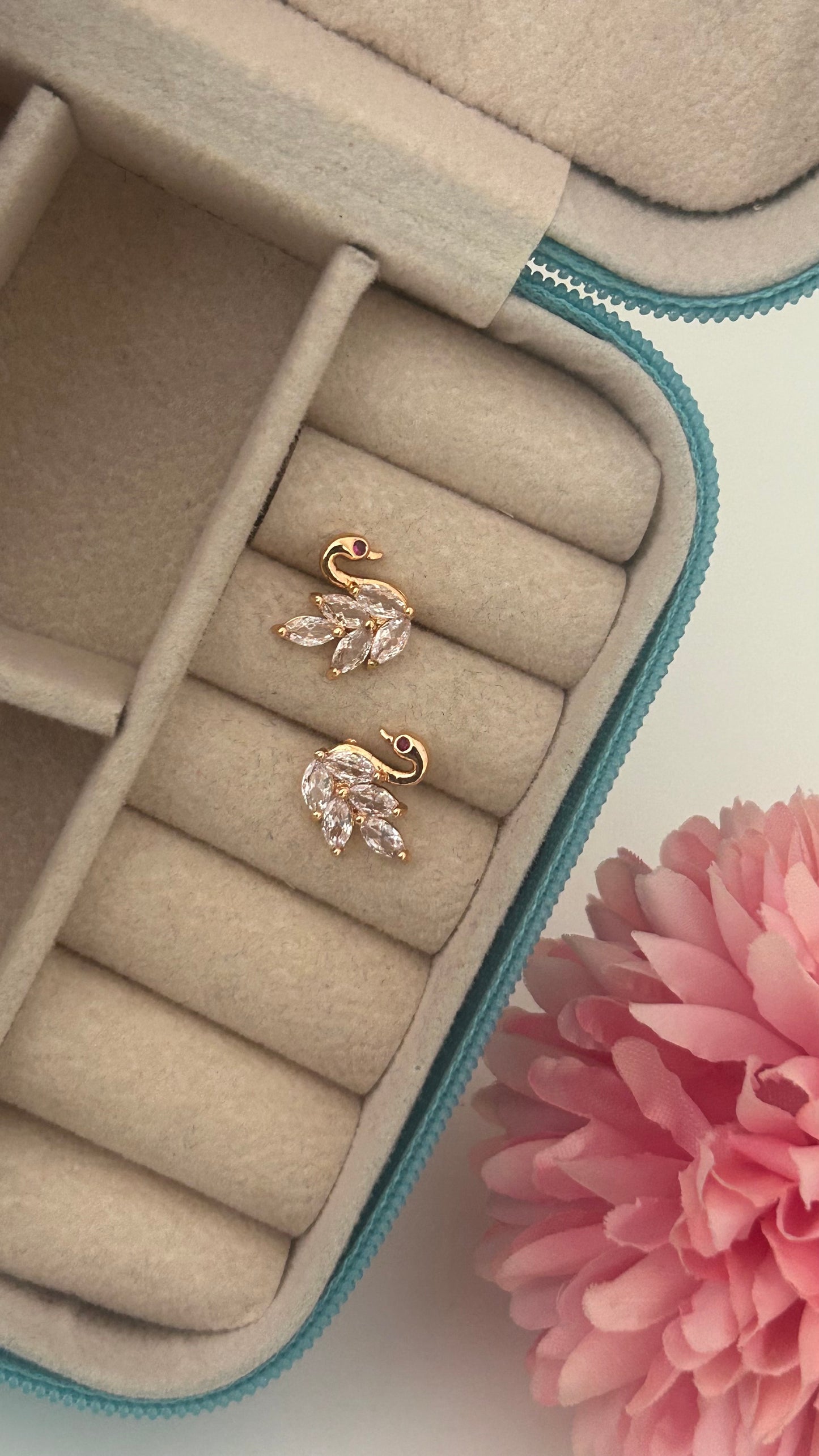 Gold-Plated Swan Shaped Stud Earrings – CZ Feather Design with Ruby Eye Accent