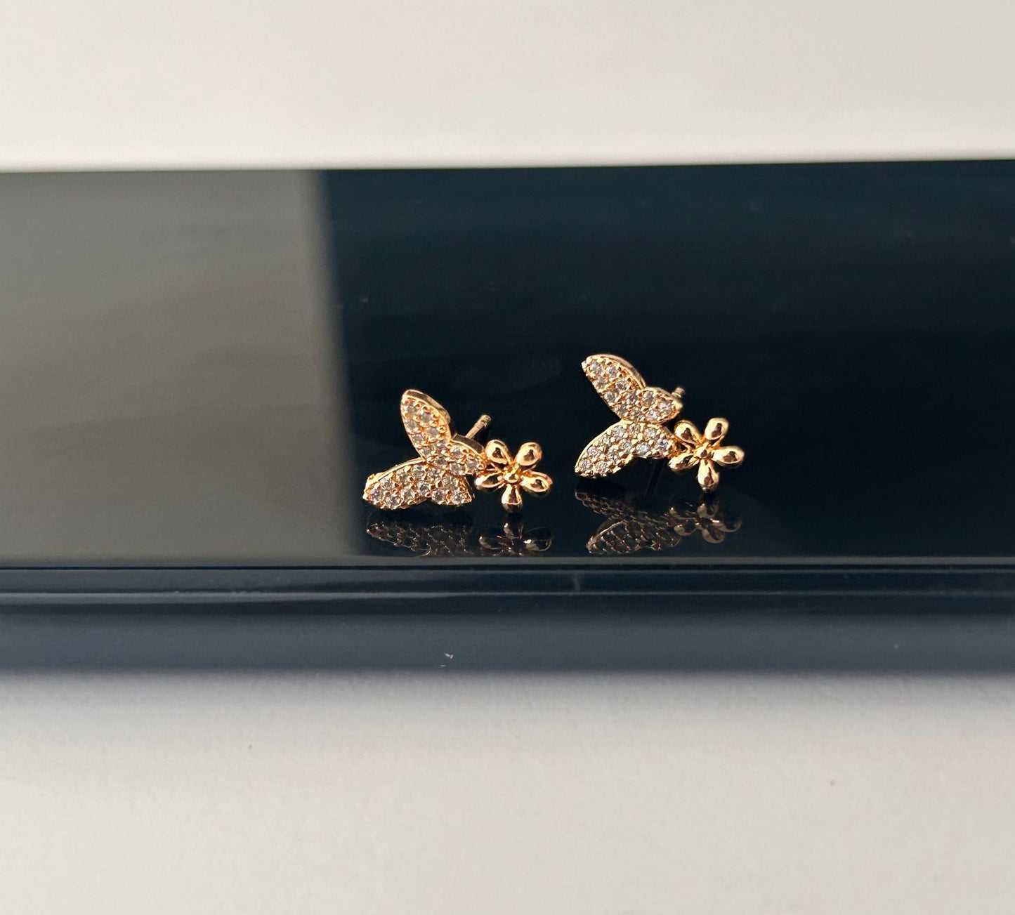 CZ butterfly stud with small flower