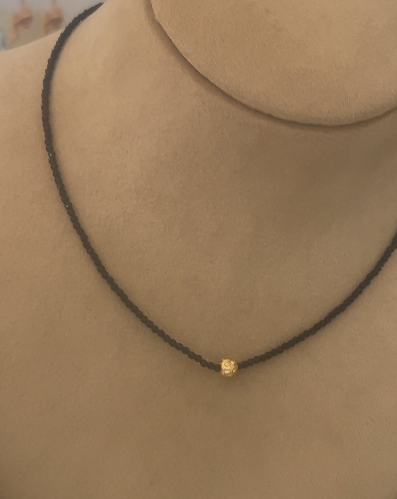 Simple black beads with gold ball in 15 inches