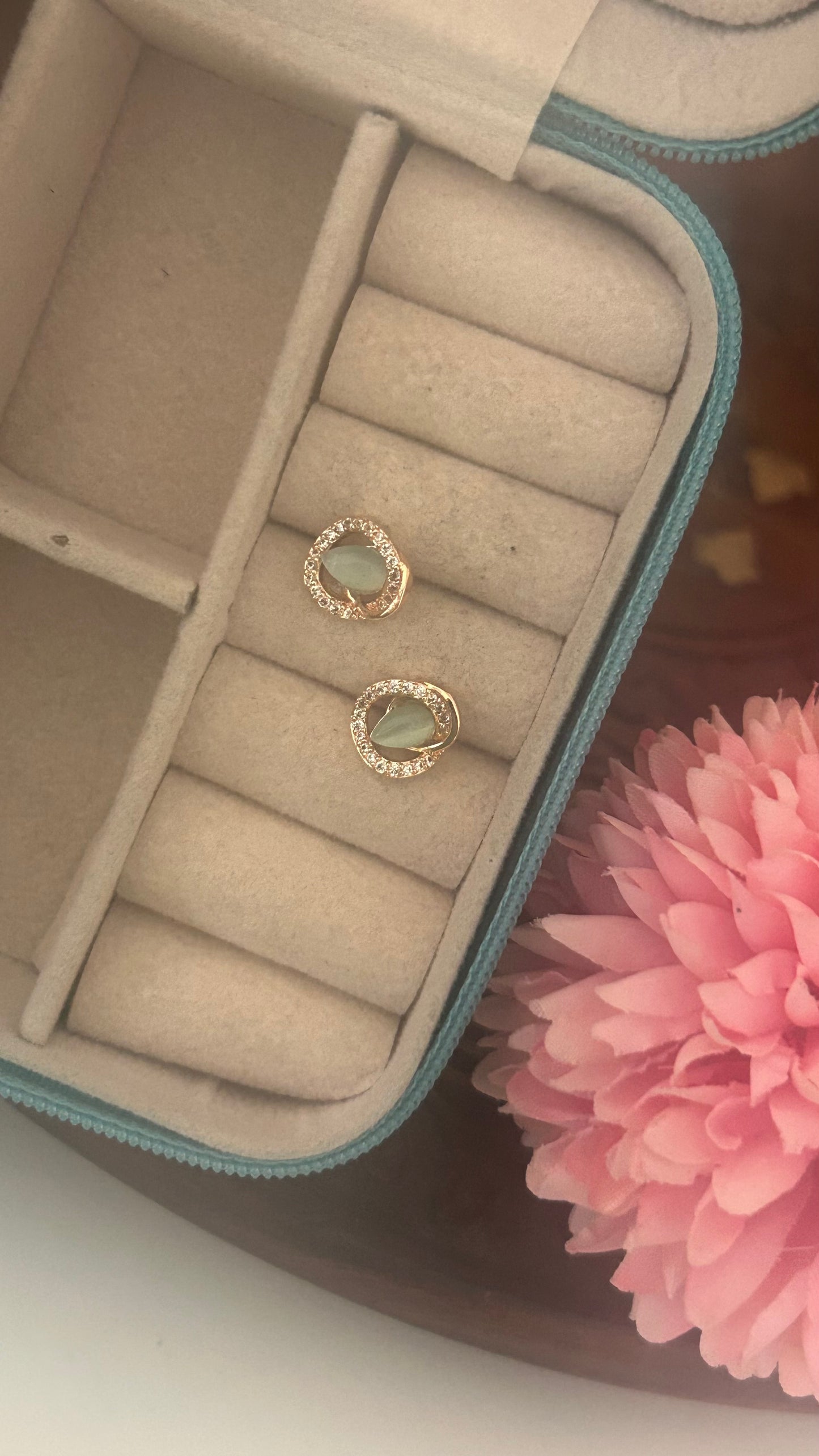 Cz round shape stud in light green colour