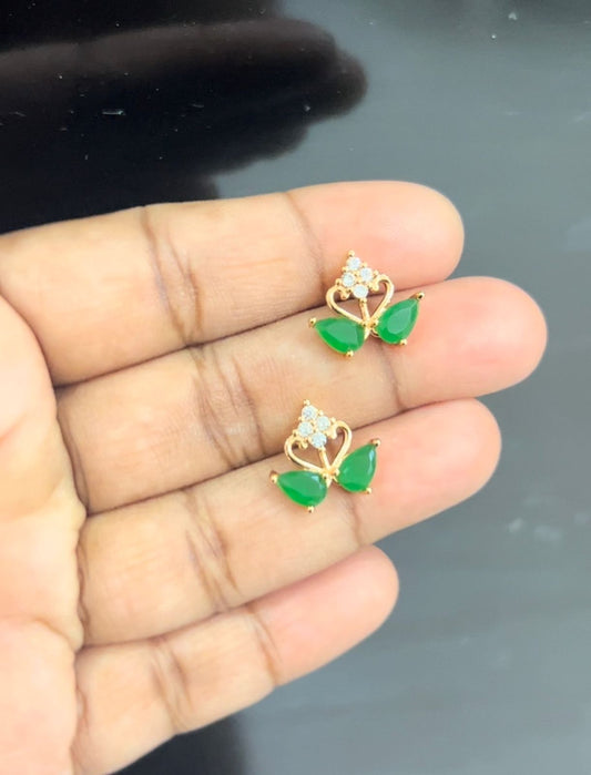 Swan shape white and green stone stud earrings