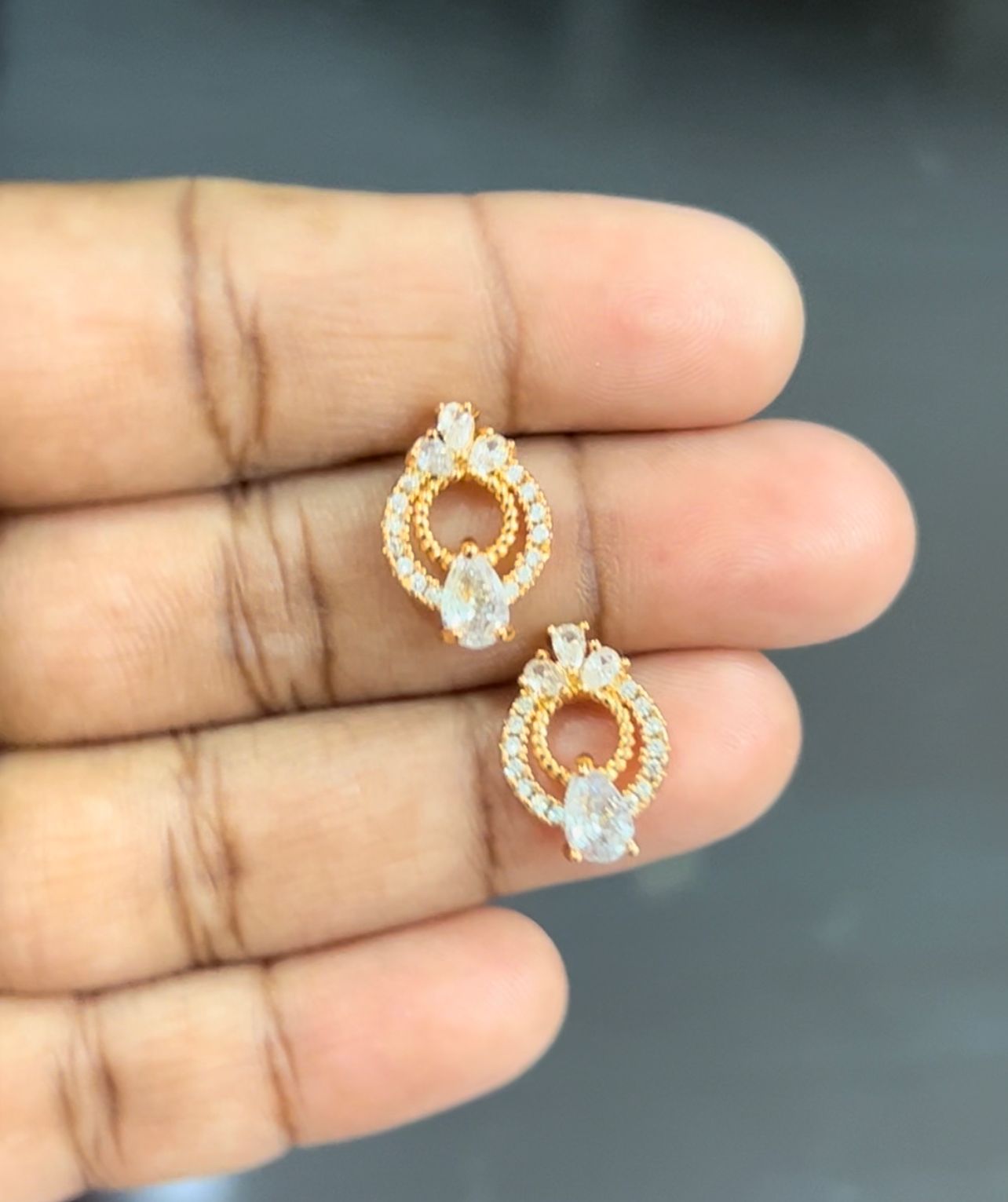 Gold color plated white stone studs