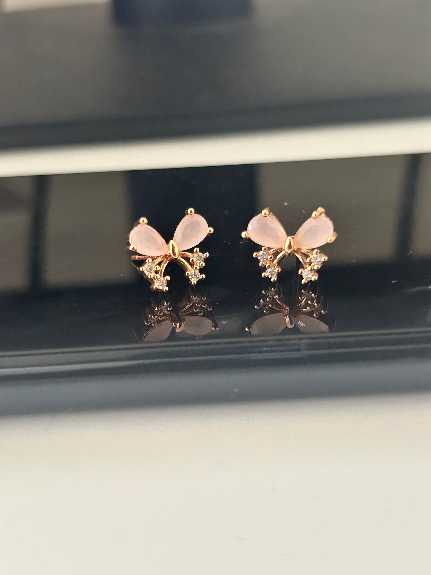 CZ floral butterfly stud