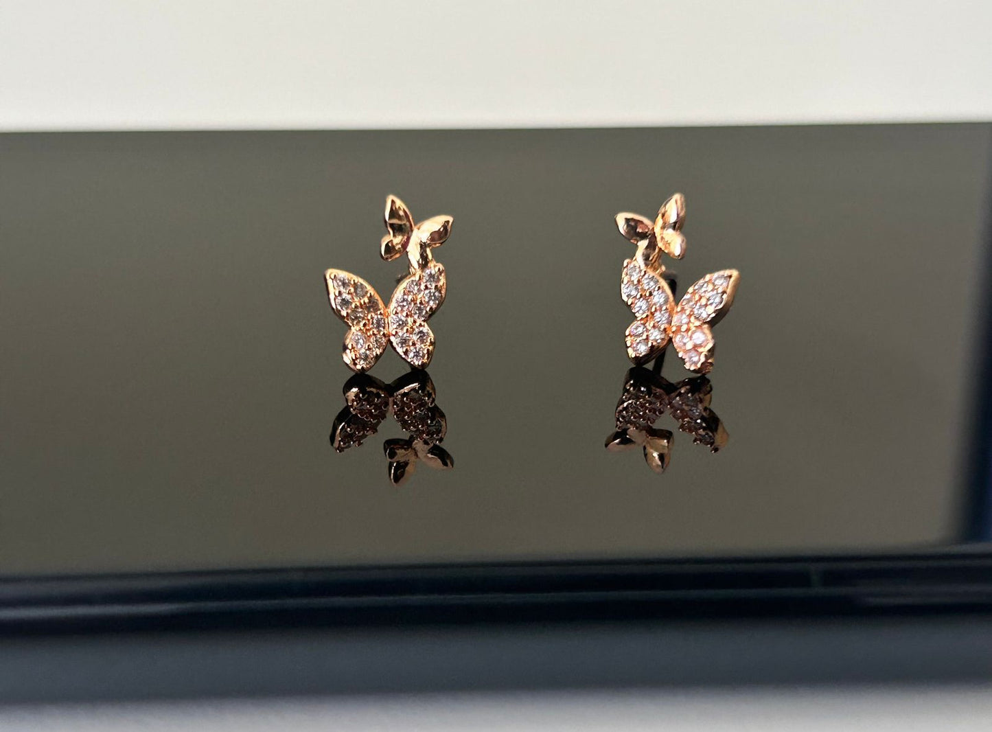 CZ cute 2 butterfly stud