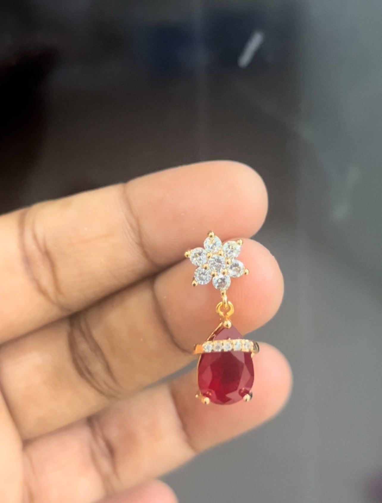 CZ white flower stud with red stone hanging