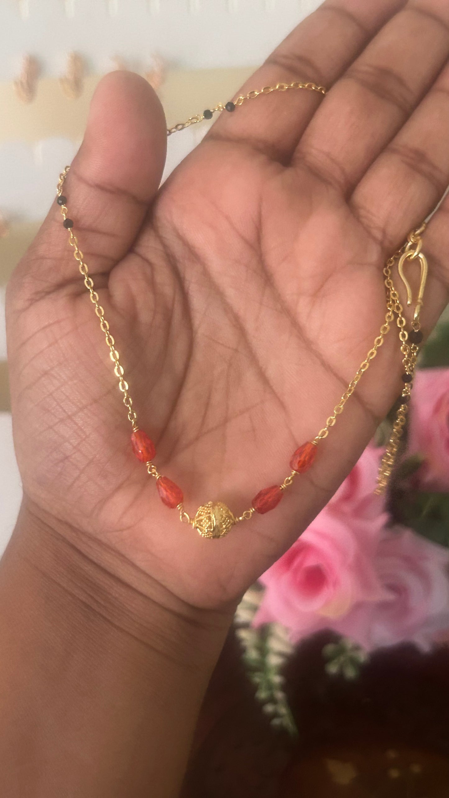 Blackbeads with Cz drops in 16 to 17 inches in orange colour