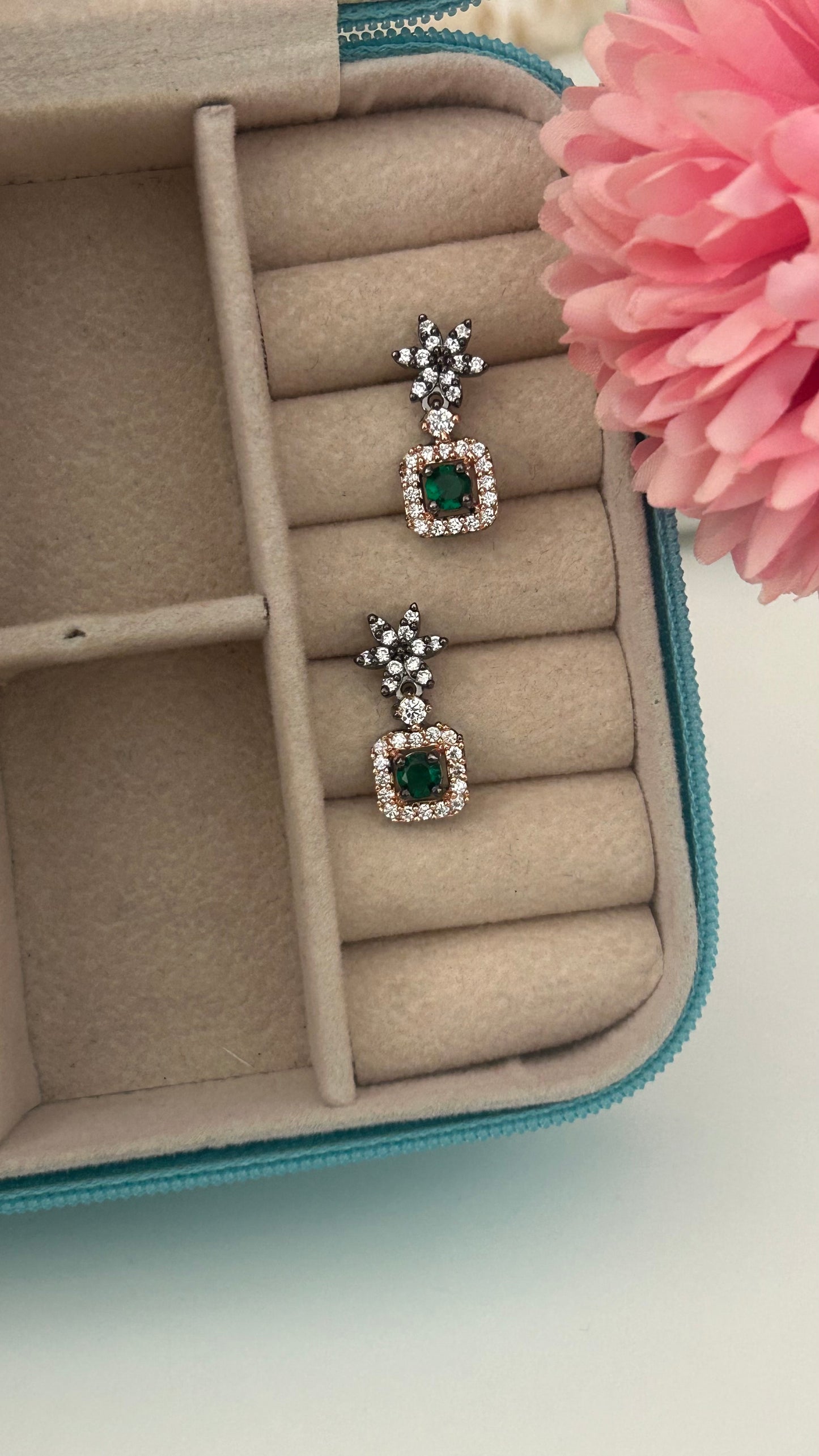 CZ flower stud with green stone