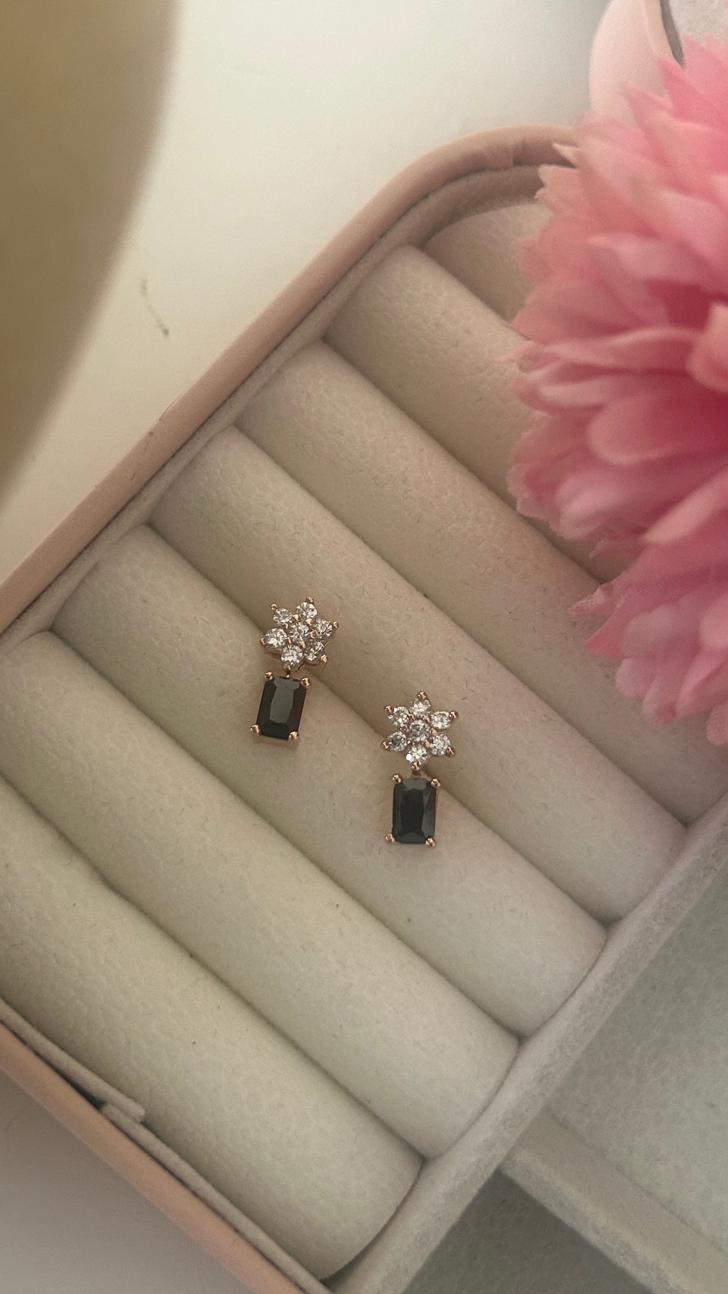 CZ white flower stud with black stone