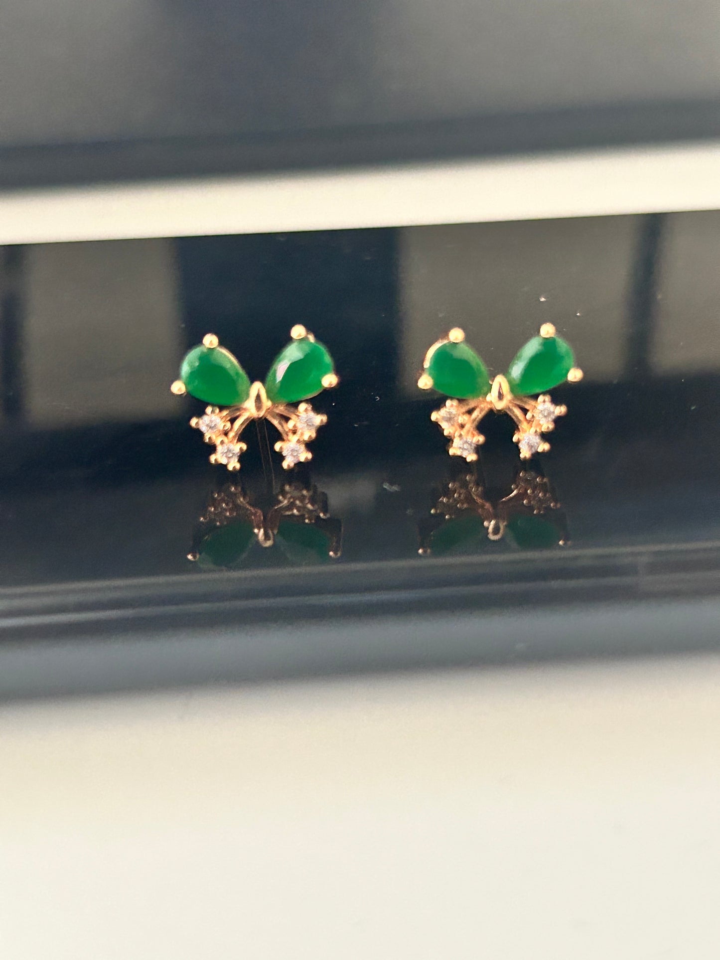 CZ floral butterfly stud