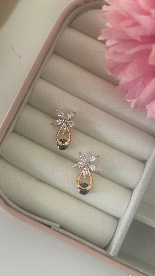CZ flower stud with black stone